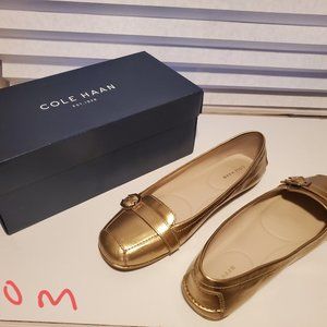Cole Haan gold flats